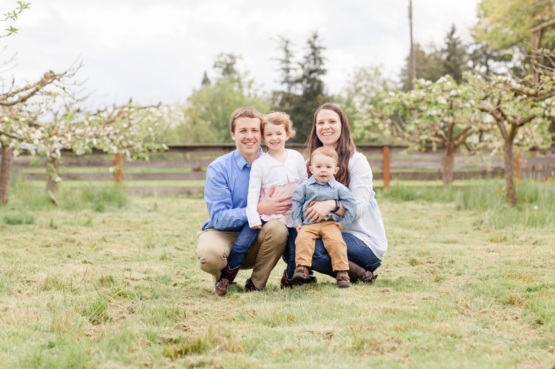 Family photos in an orchard at Champoeg State Park in Newberg | Hillsboro Family Photographer