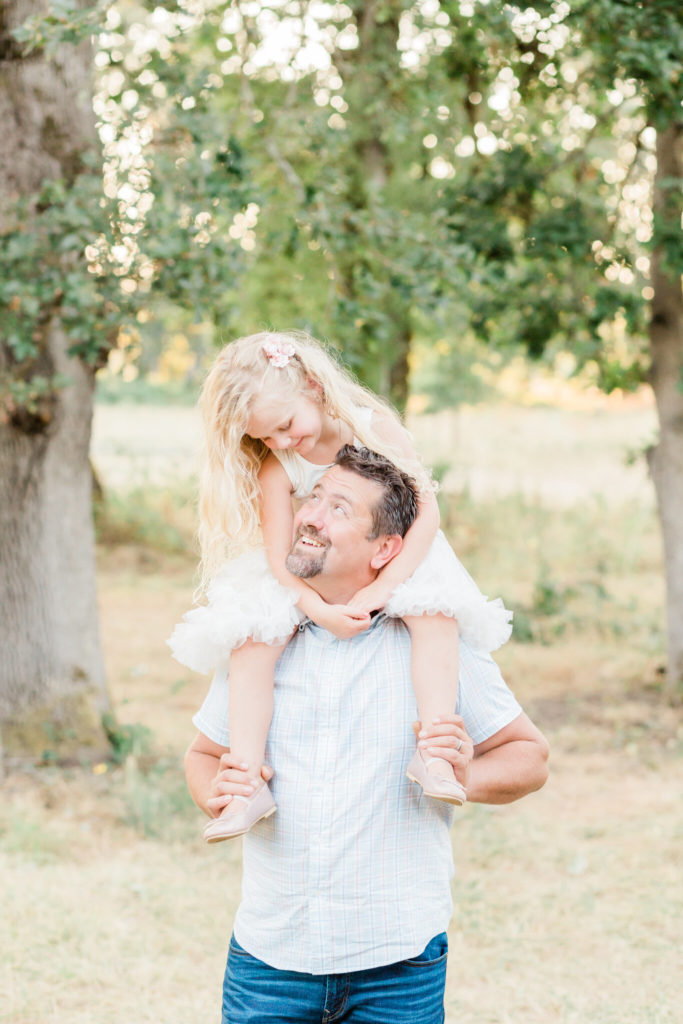 father daughter portrait in the oak grove at champoeg state park near portland oregon