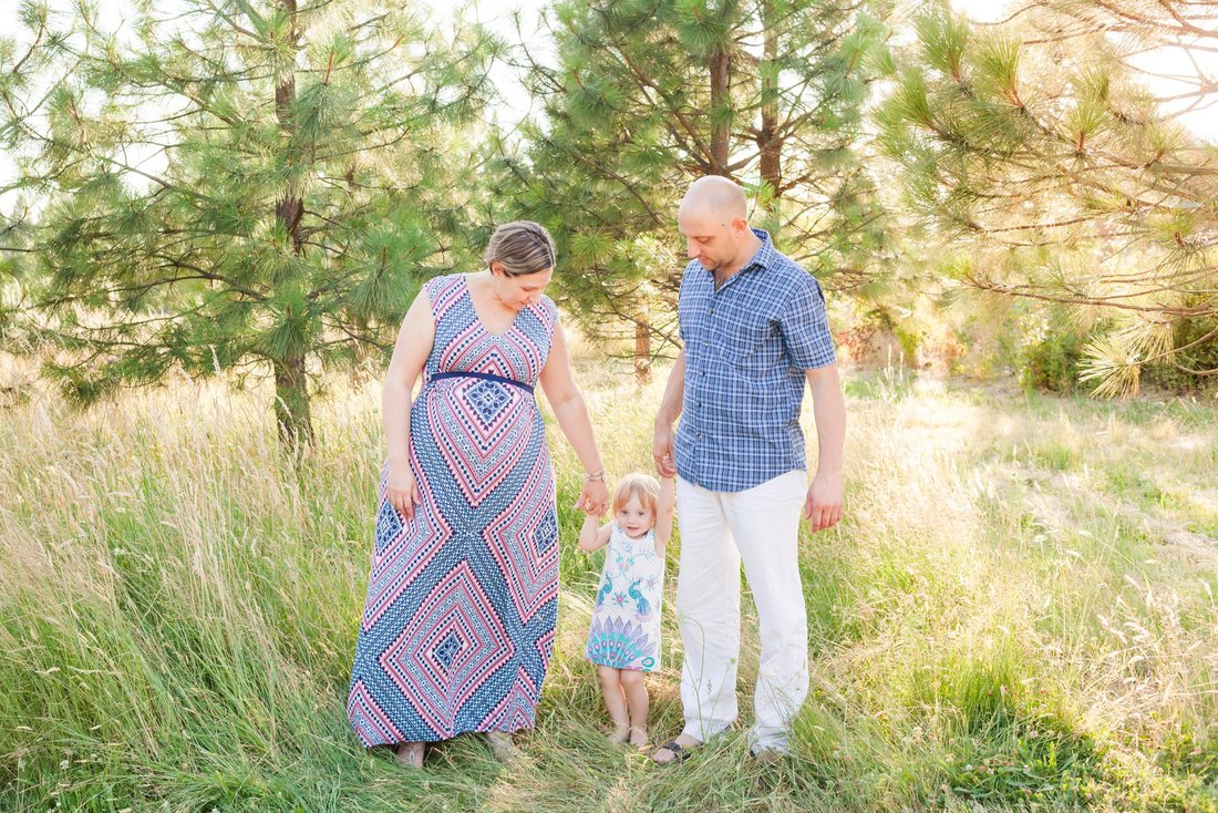 Family and maternity pictures in a field at sunset at Cooper Mountain Nature Park in Aloha, Oregon | Newberg and Hillsboro family photographer