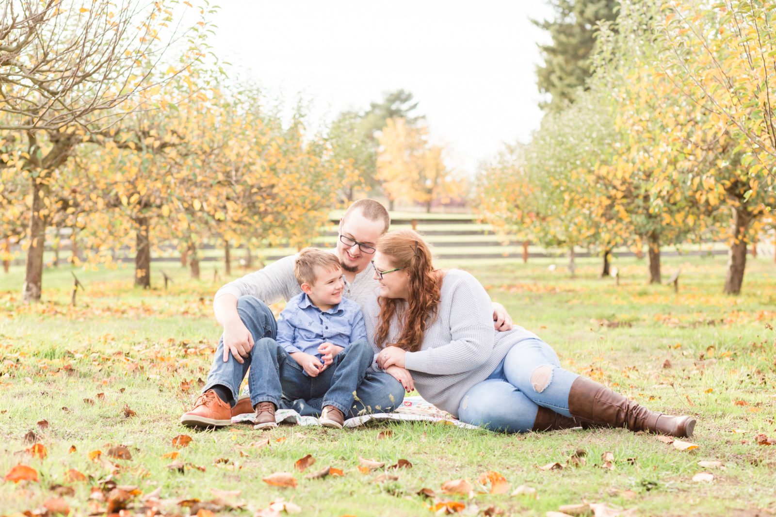 fall family pictures in an orchard near hillsboro, oregon