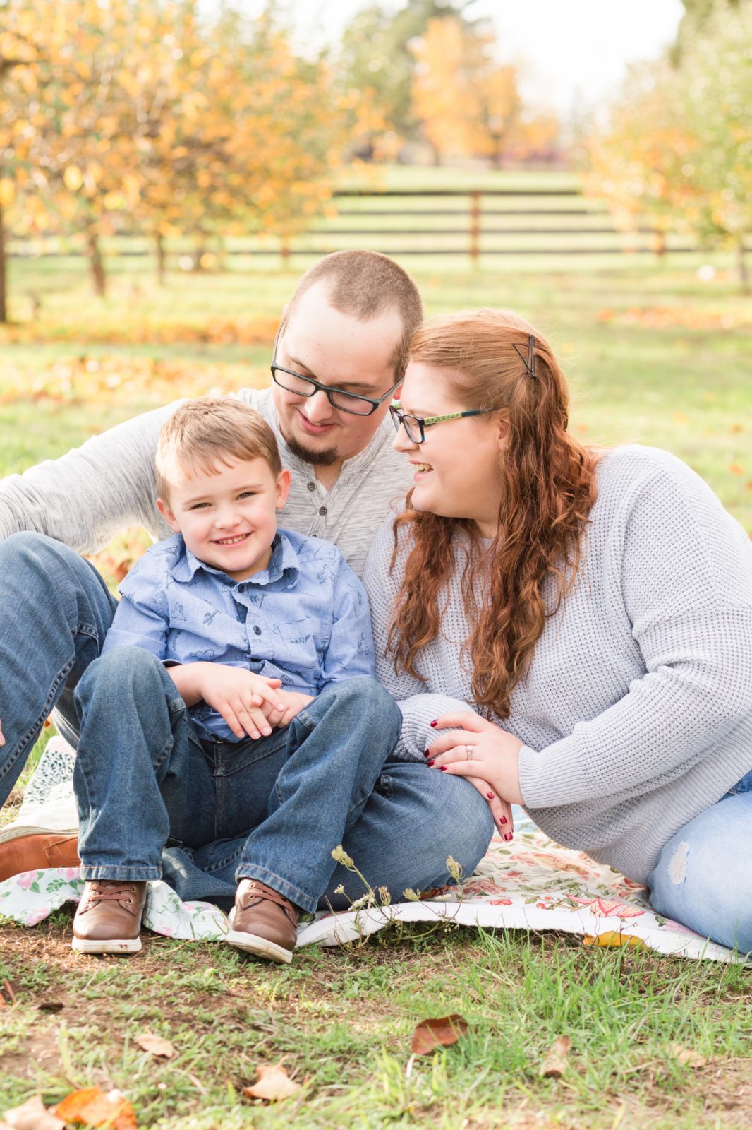 fall family pictures in an orchard near hillsboro, oregon