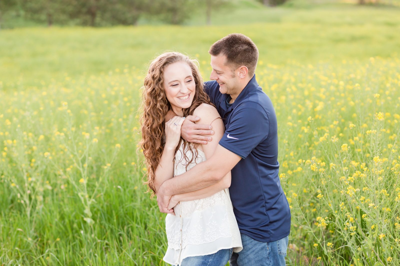 yellow flower field engagement session in mcminnville, oregon