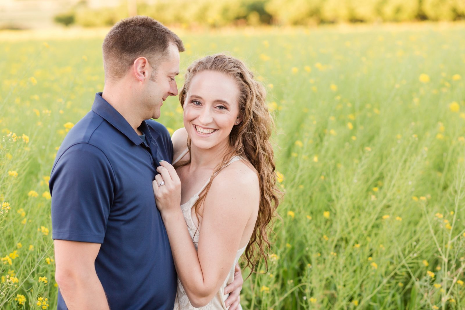 yellow flower field engagement session in mcminnville, oregon