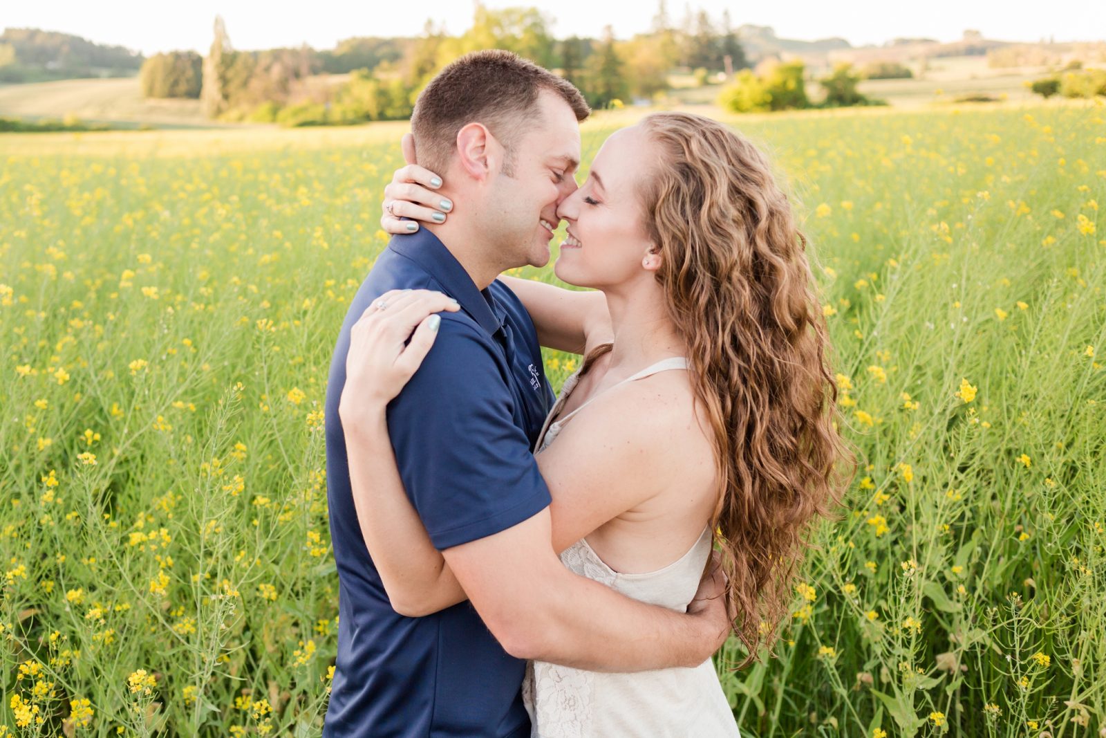 yellow flower field engagement session in mcminnville, oregon