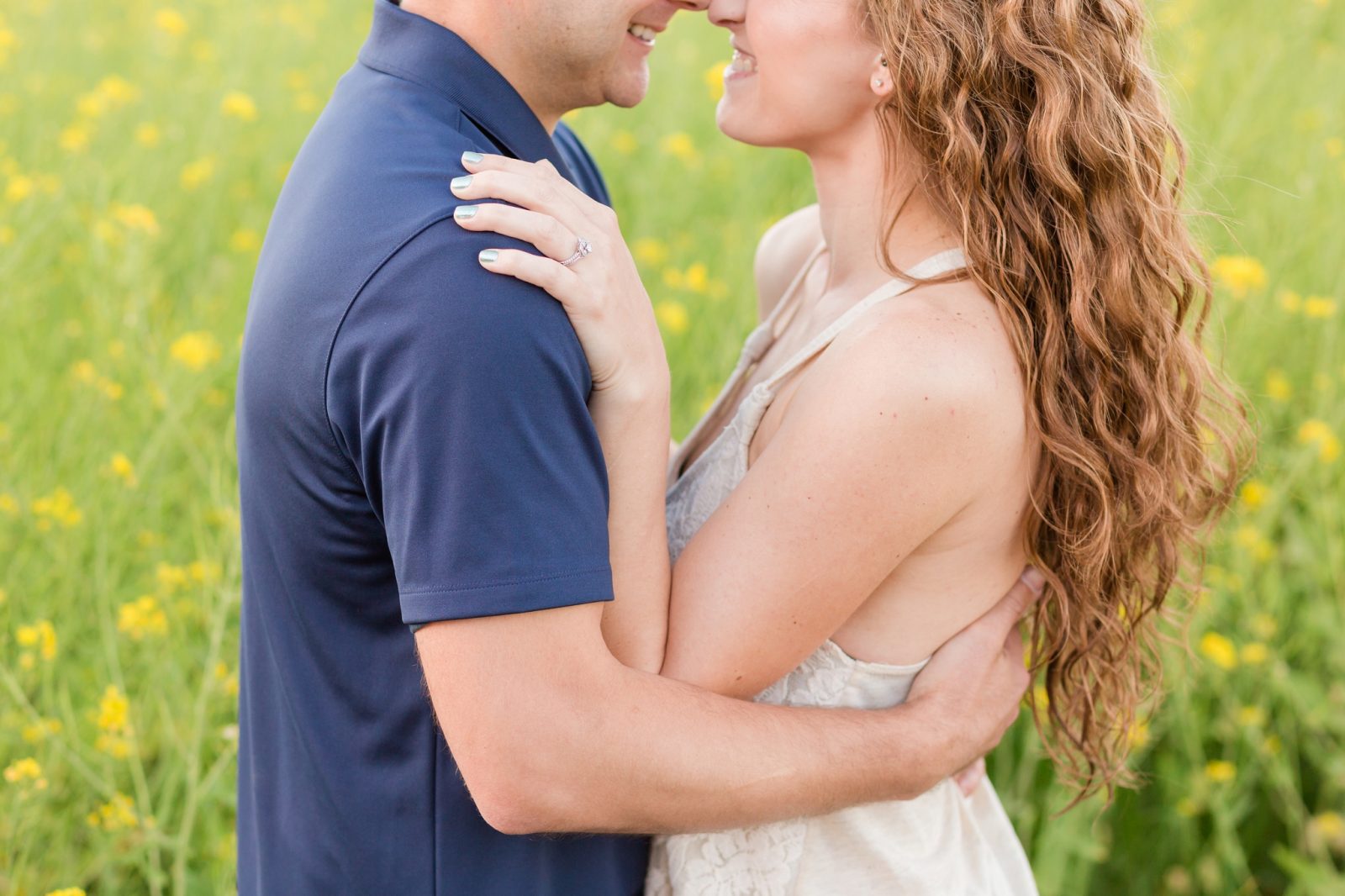 yellow flower field engagement session in mcminnville, oregon