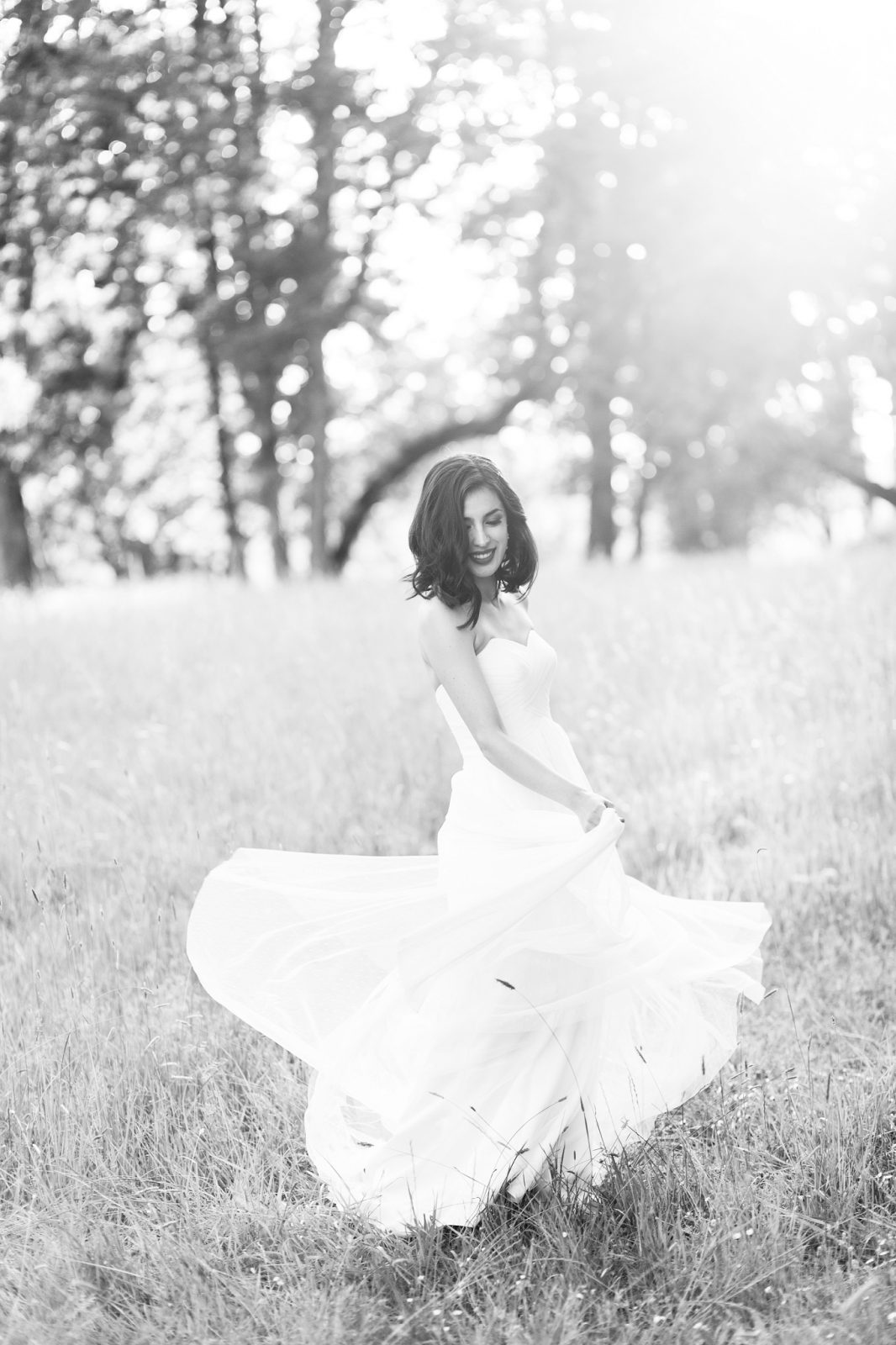black and white wedding dress in a field