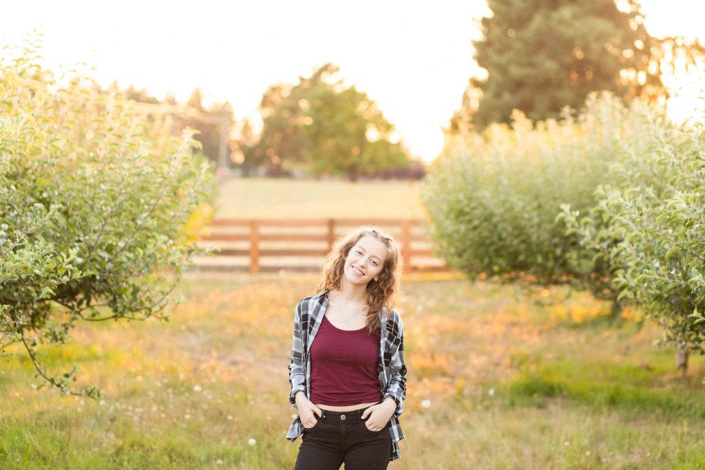 portrait of a girl in an orchard