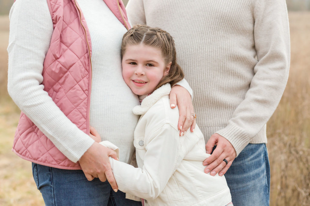 photo of daughter hugging mother during maternity photos