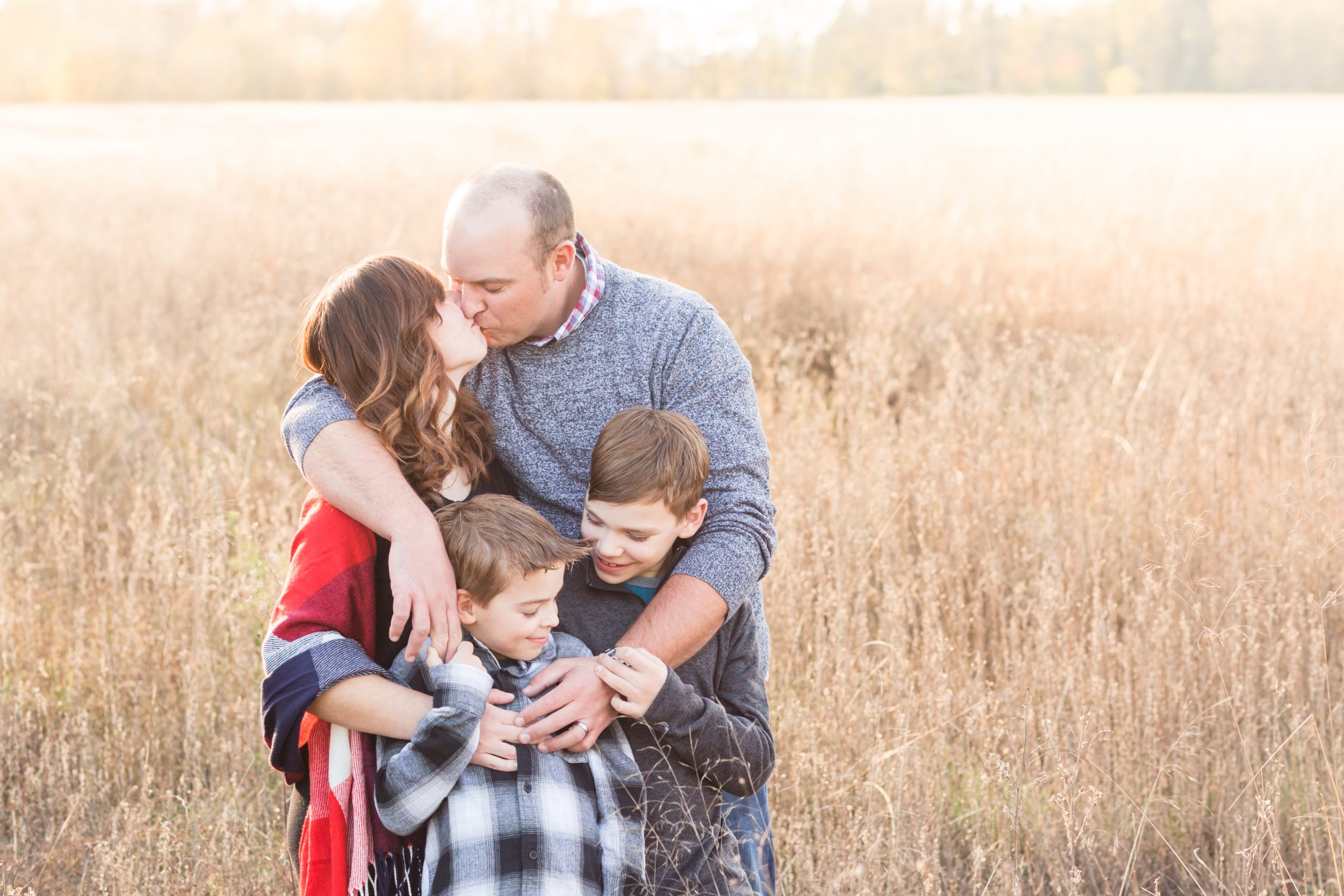 fall family photos in a field hillsboro family photographer