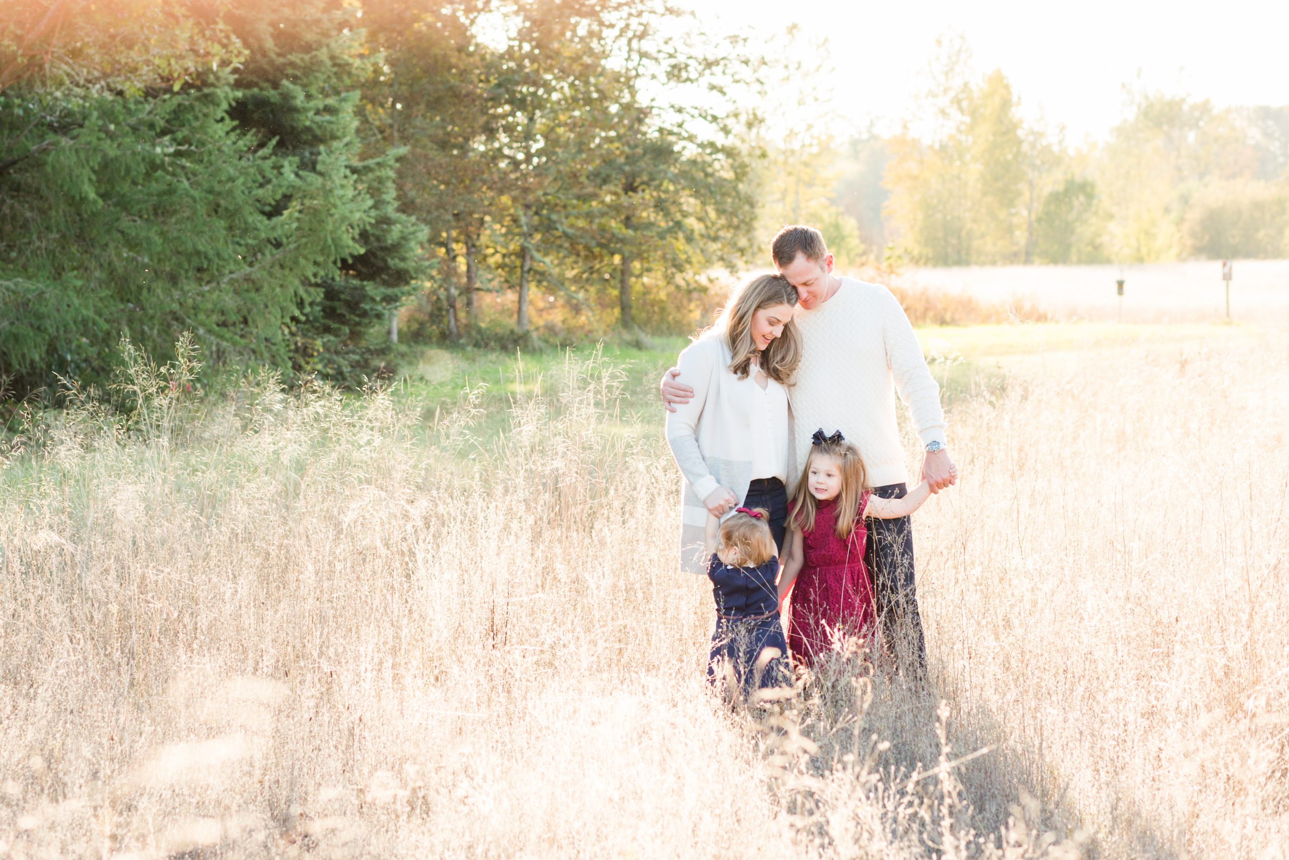 fall family photos in a field hillsboro family photographer