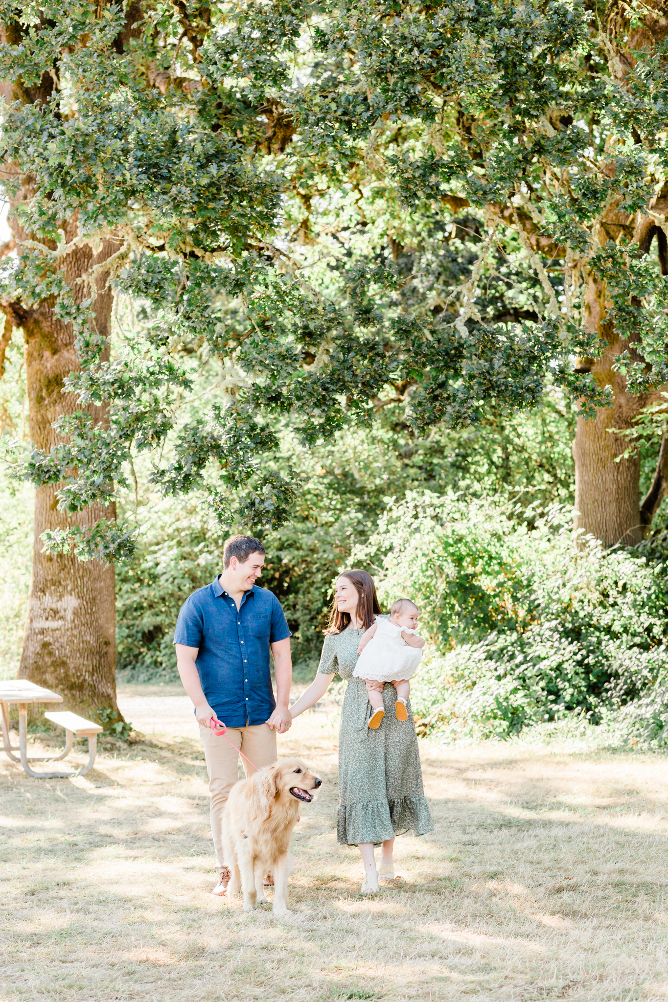 family of three with their dog in hillsboro family photos