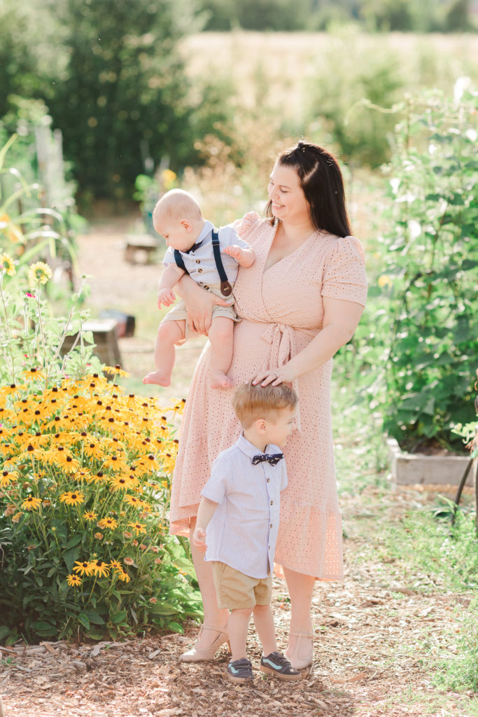 mom and children in the garden at luscher farm for lake oswego photos