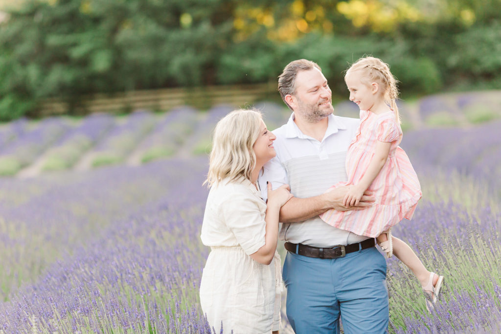 Family of 3 in a lavender field