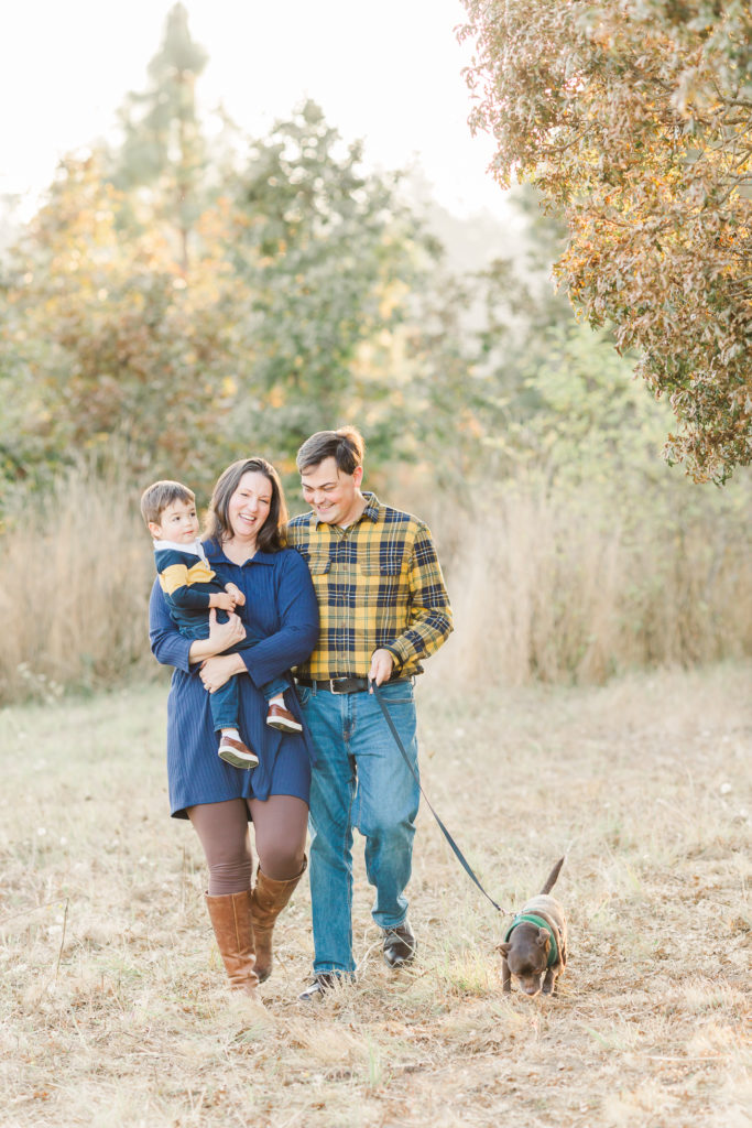 family of three and a dog for fall photos in portland oregon