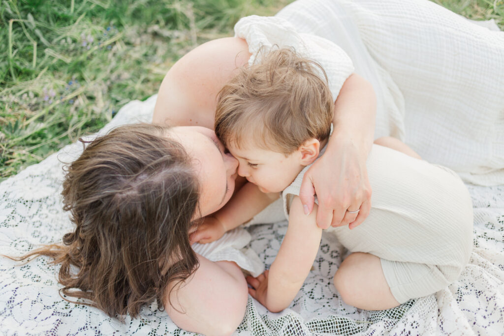 Mom and baby on a blanket by Portland motherhood photographer Samantha Shannon