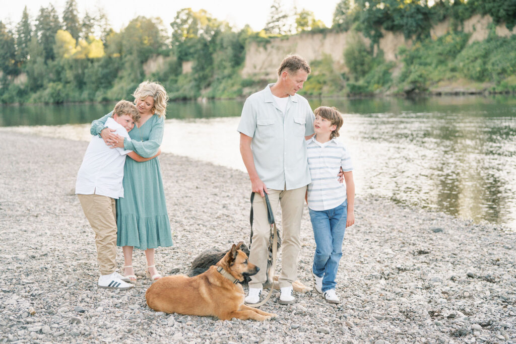 family with dogs at river family photos salem oregon photography by Samantha Shannon